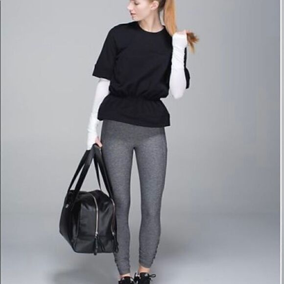 Size 4 Black Rare Lululemon Peplum Pullover - Picture 1 of 5